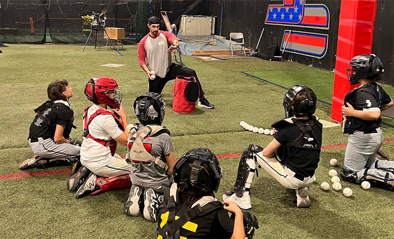 Baseball catcher's training with certified hitting instructors